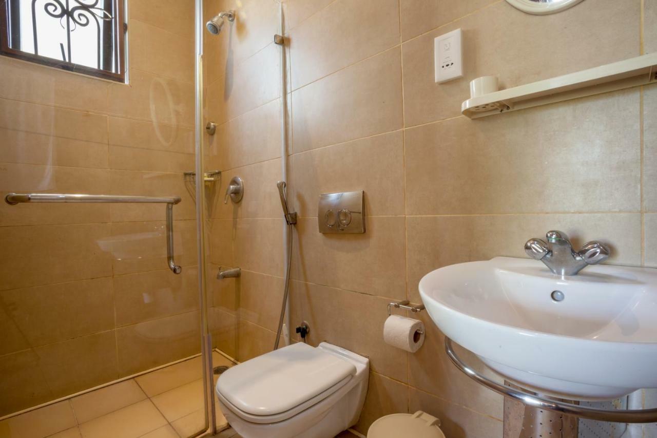 Amani Luxury Apartments Момбаса Экстерьер фото